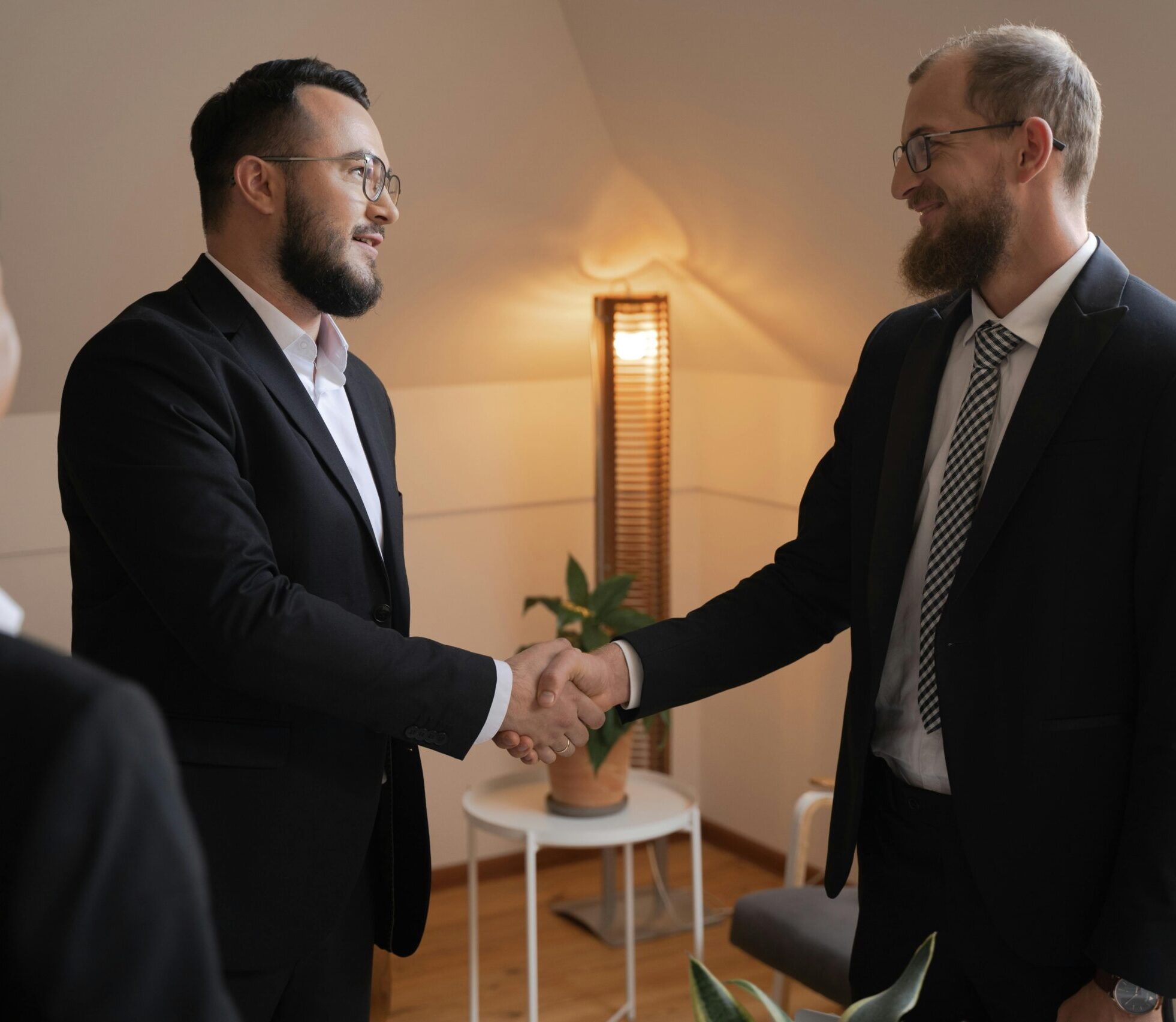 two men shaking hands