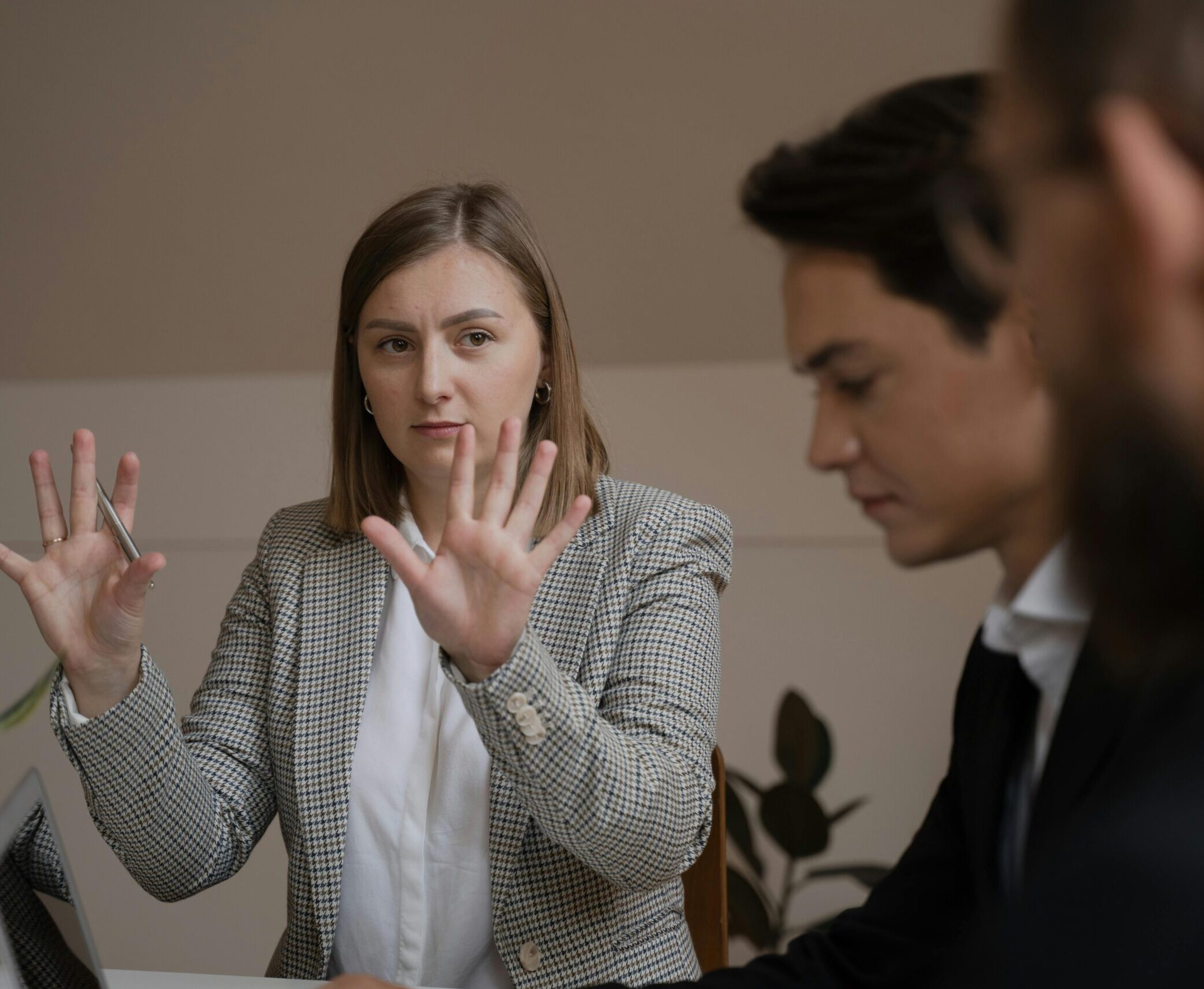 woman explaining something during a meeting